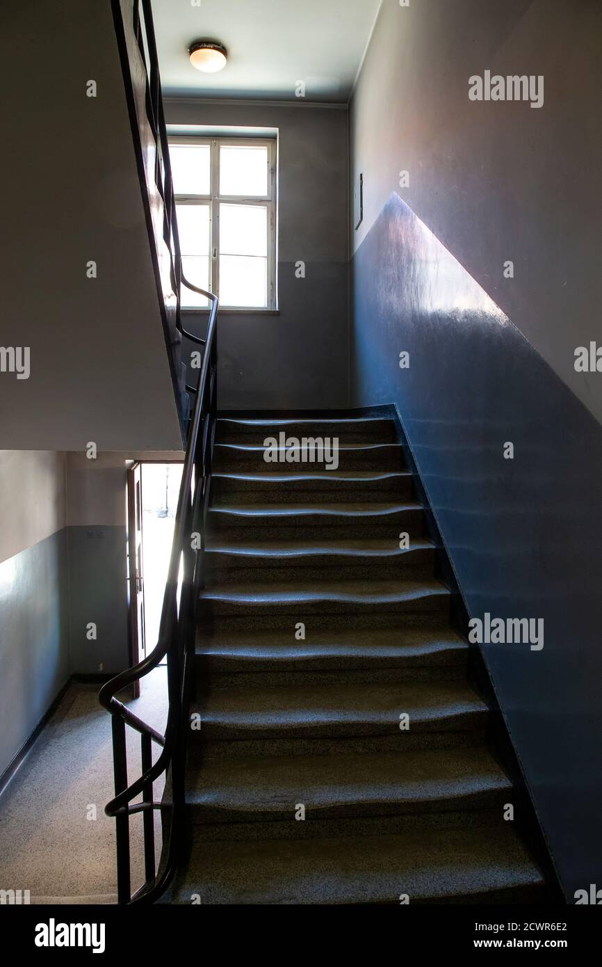 A view of the stairs inside one of the prison blocks at Auschwitz concentration camp memorial in Poland Stock Photo