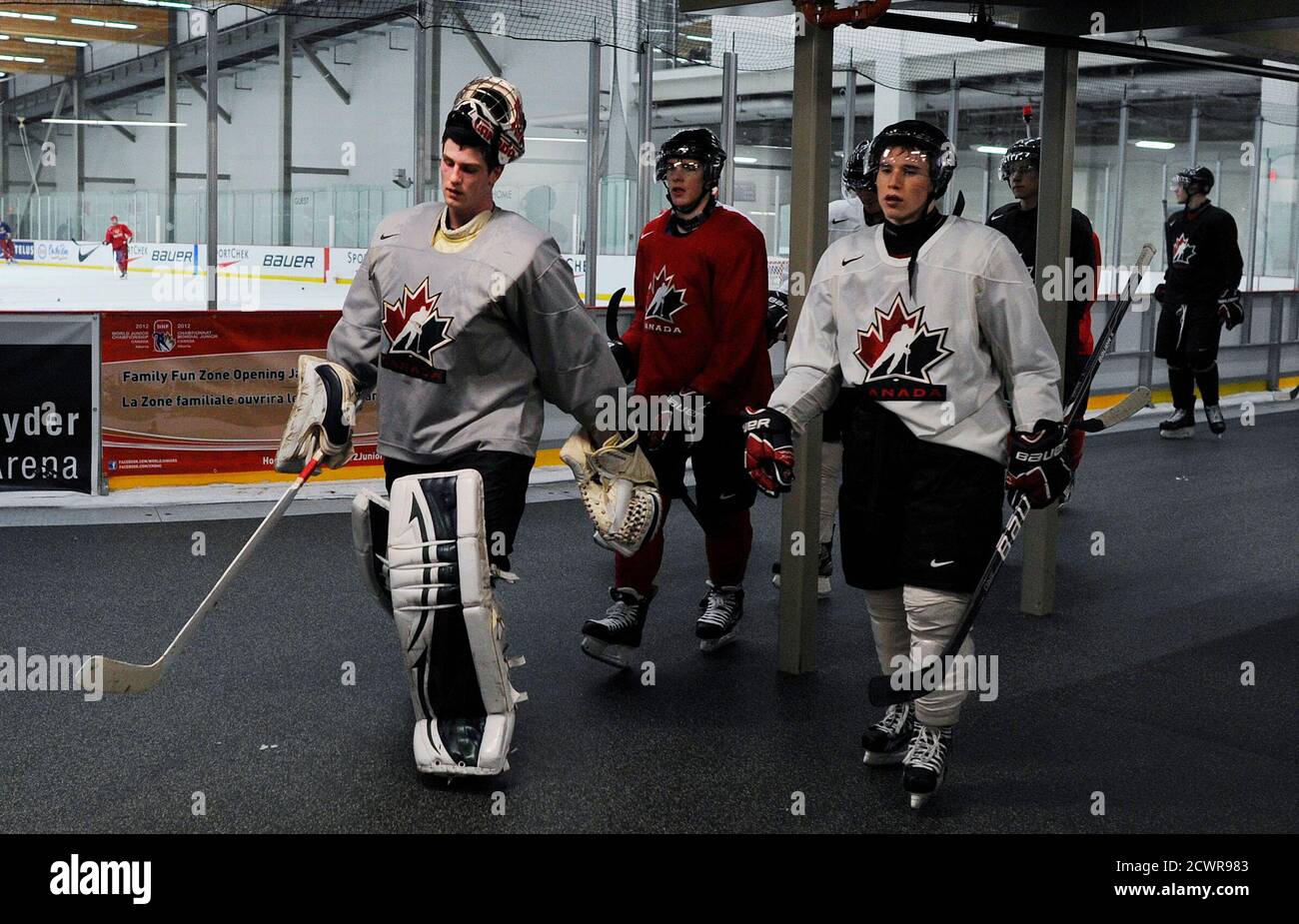 Canada S Goalie Scott Wedgewood L And Brendan Gallagher R Lead Their Team To The Dressing Room After Their Practice At The 2012 Iihf U20 World Junior Hockey Championships In Calgary Alberta January