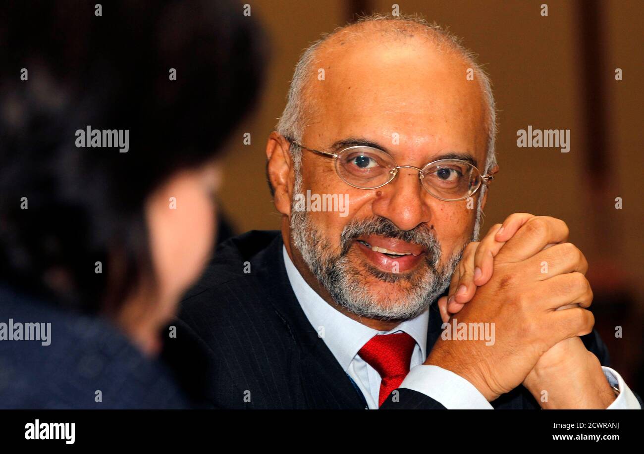 Chief executive of DBS Group Holdings Piyush Gupta (R) chats with  Indonesia's Minister of Tourism and creative Economy Mari Elka Pangestu at  the venue of the Globe Asia Business Summit in Jakarta