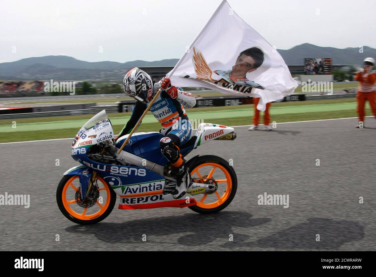 FTR Honda Moto3 rider Maverick Vinales of Spain celebrates his victory of  the Catalunya MotoGP Grand Prix in Montmelo, near Barcelona, June 3, 2012.  REUTERS/Gustau Nacarino (SPAIN - Tags: SPORT MOTORSPORT Stock