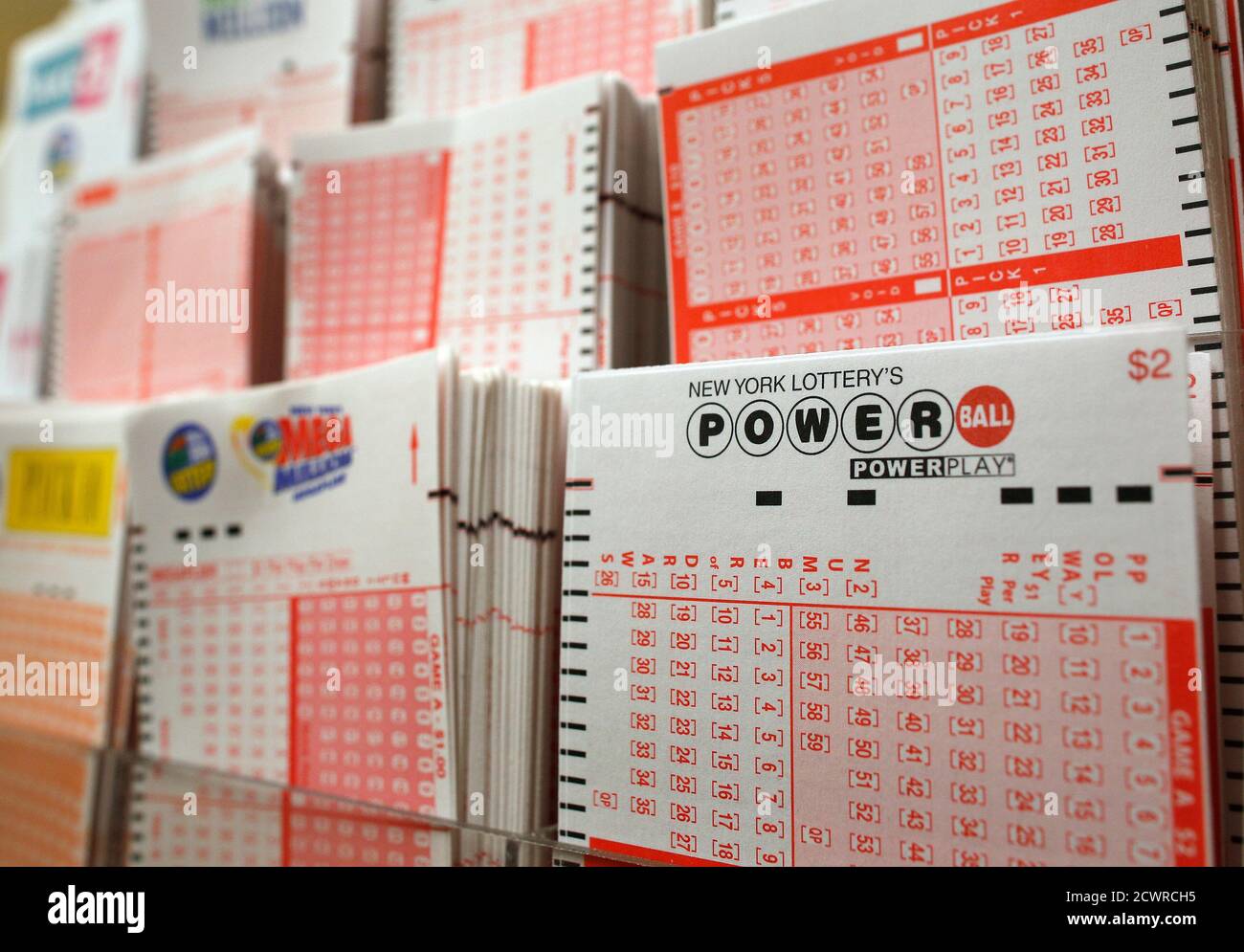 Cards for lottery customers to pick their own numbers are stacked on a rack  at a store where people buy tickets for the Powerball lottery in New York,  November 28, 2012. Dreams