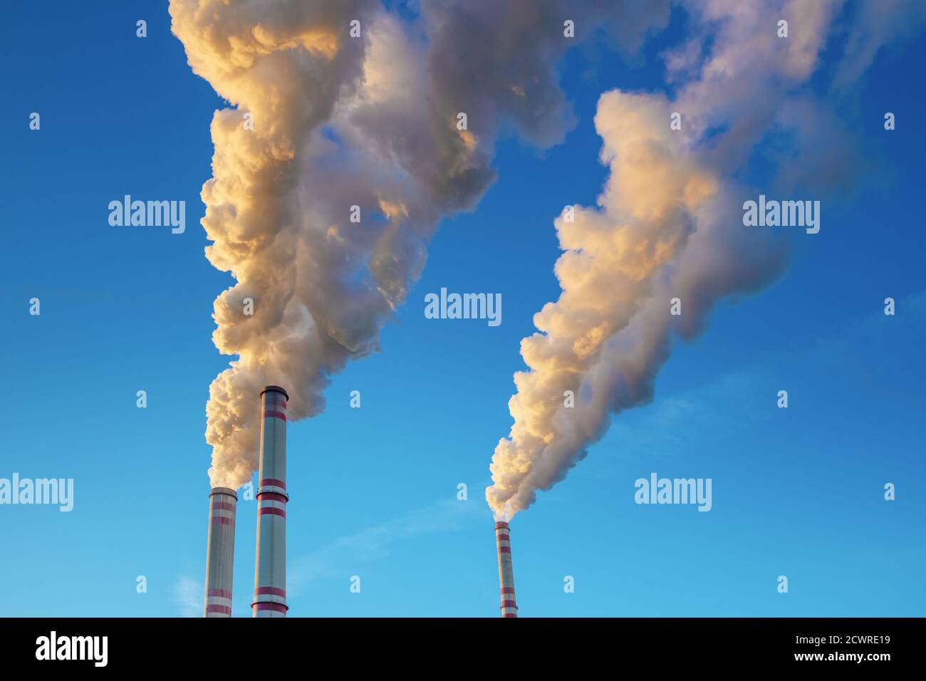 Smoke stacks of coal power plant Stock Photo
