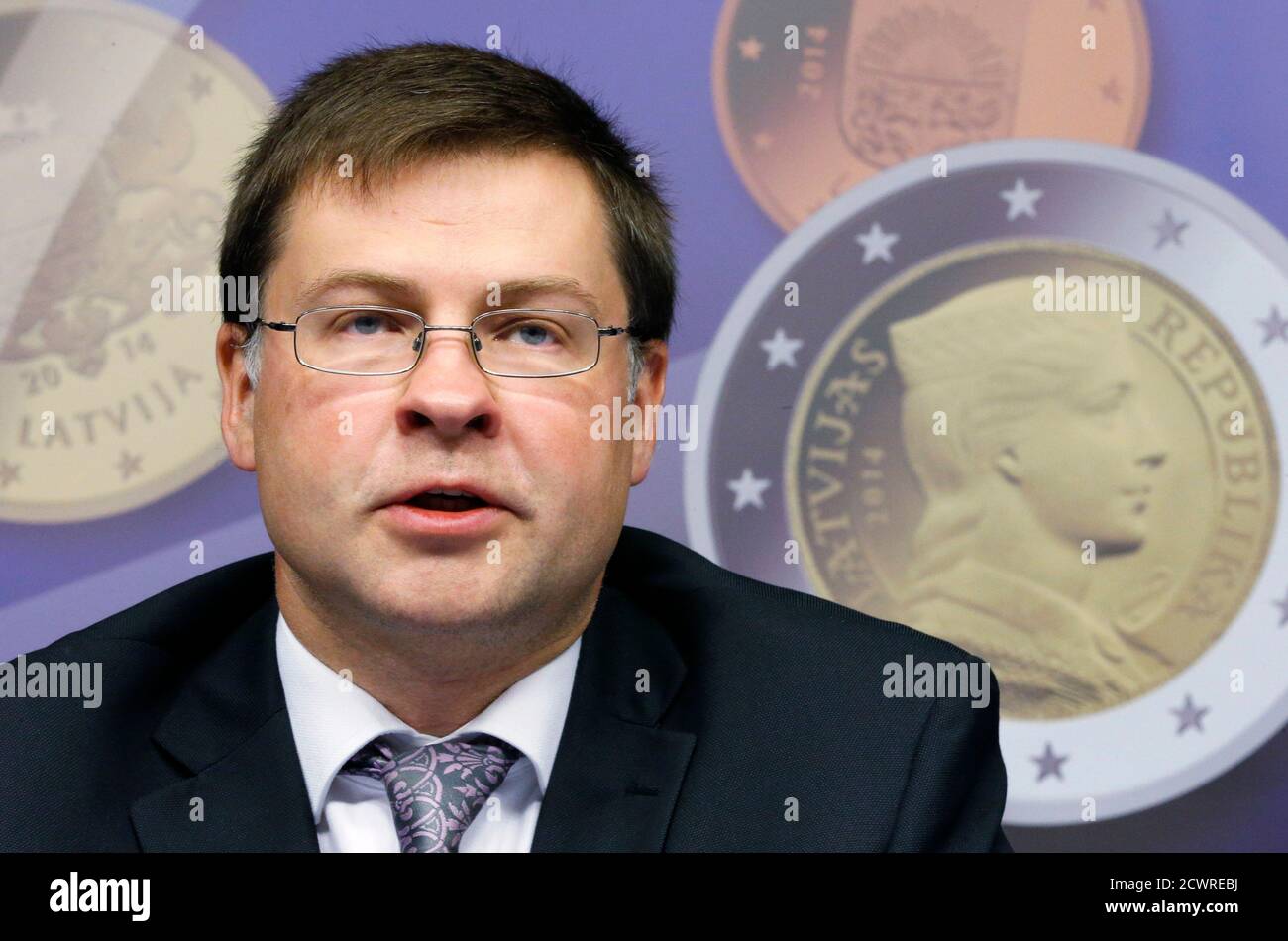 Latvia's Prime Minister Valdis Dombrovskis addresses a news conference on the adoption of the euro by Latvia at the European Union council building in Brussels July 9, 2013. The euro zone embraced tiny Latvia as its newest member on Tuesday, eager to show that the bloc is not disintegrating while doubts remain about southern Europe's ability to overcome more than three years of crisis.   REUTERS/Francois Lenoir (BELGIUM - Tags: POLITICS BUSINESS HEADSHOT) Stock Photo