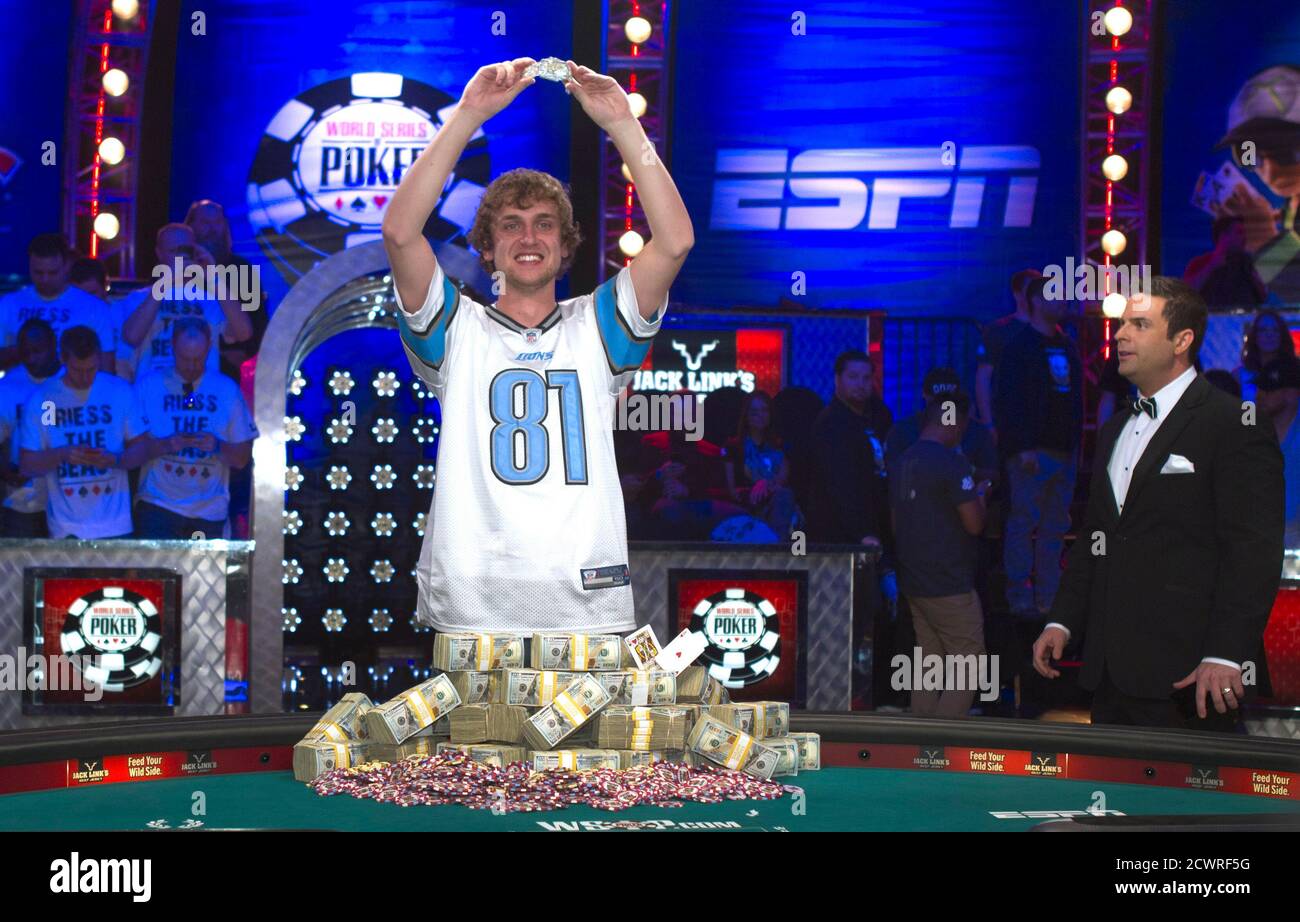Ryan Riess, 23, a poker professional from East Lansing, Michigan, poses with his championship bracelet after winning the World Series of Poker $10,000 buy-in no-limit Texas Hold 'Em tournament at the Rio Hotel & Casino in Las Vegas, Nevada November 5, 2013. Riess took home $8,359,531 in prize money for first place. REUTERS/Steve Marcus (UNITED STATES - Tags: SOCIETY TPX IMAGES OF THE DAY) Stock Photo