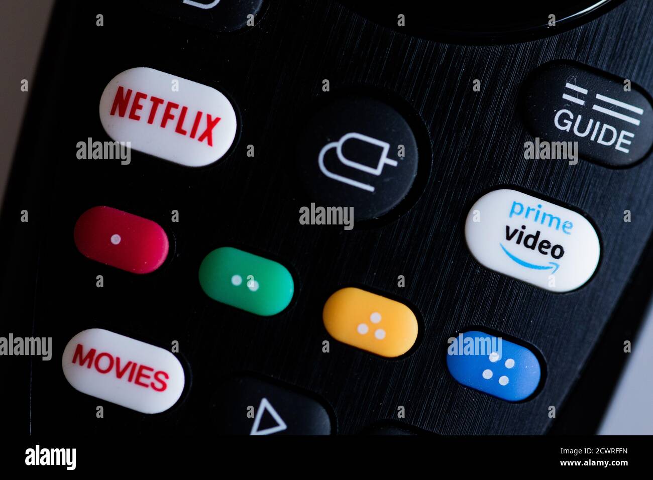Cologne, Germany. 30th Sep, 2020. ILLUSTRATION - Button for the direct  start of the apps of the streaming providers Amazon Prime Video and Netflix  are shown on a remote control. Credit: Rolf
