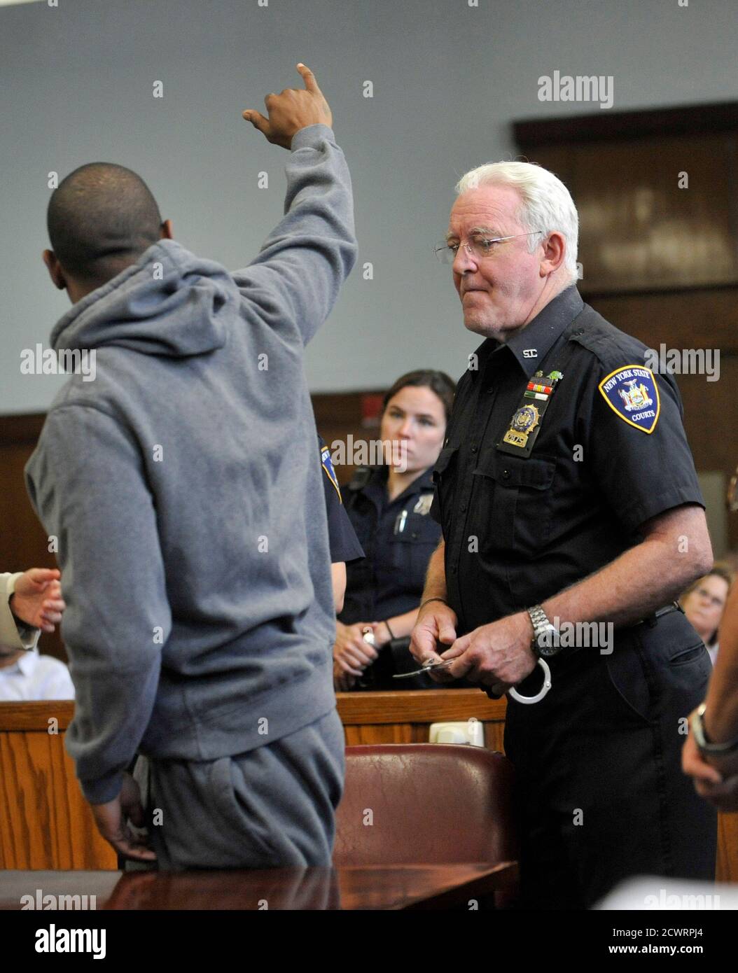 Rapper Ja Rule Whose Real Name Is Jeffrey Atkins Waves To Supporters In Manhattan Supreme Court Where He Received A Two Year Jail Sentence After Pleading Guilty To Gun Possession Charges June 8 2011