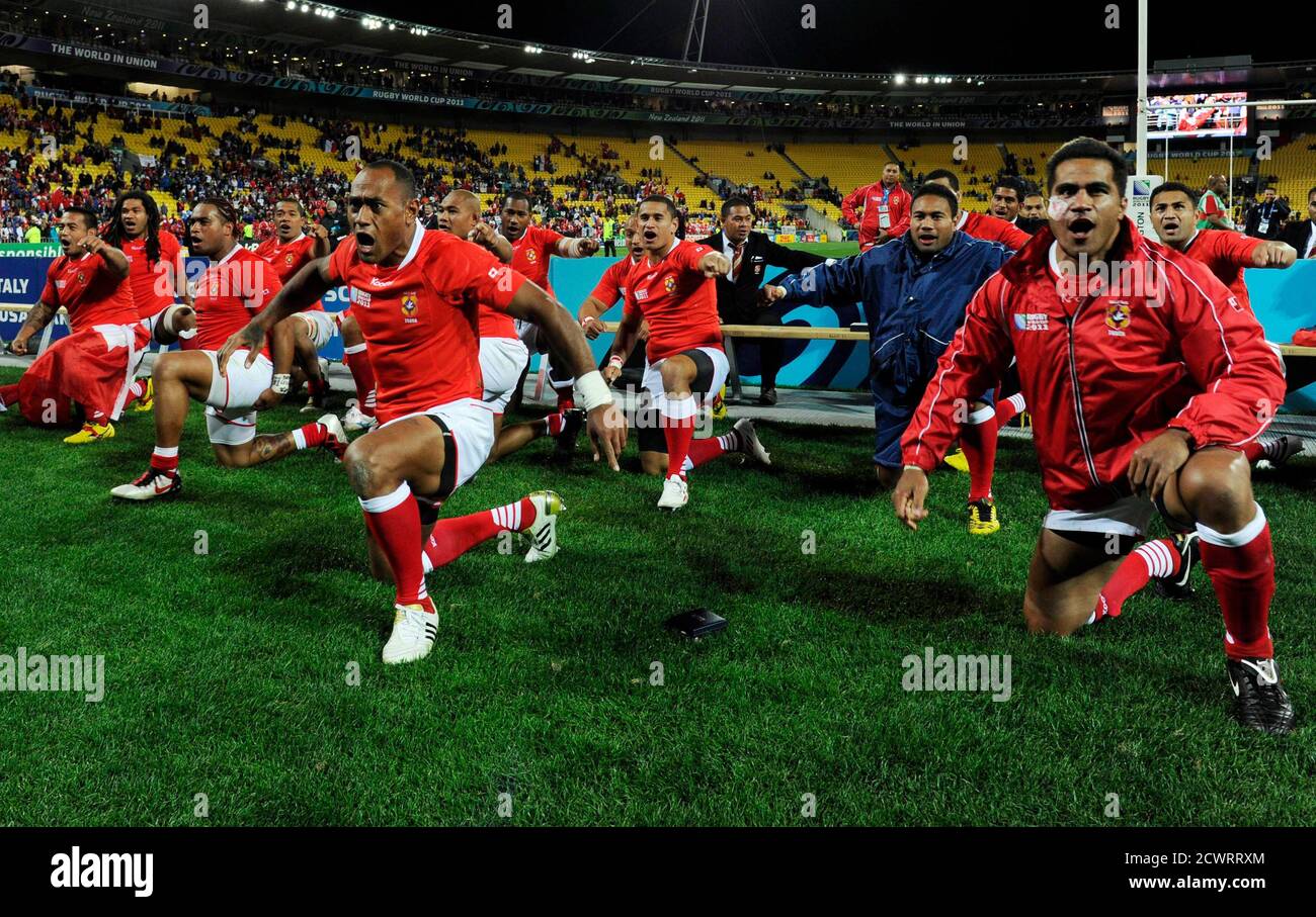 Tonga players perform the Sipi Tau for supporters after winning their Rugby  World Cup Pool A match against France at Wellington Regional Stadium in  Wellington October 1, 2011. REUTERS/Anthony Phelps (NEW ZEALAND -