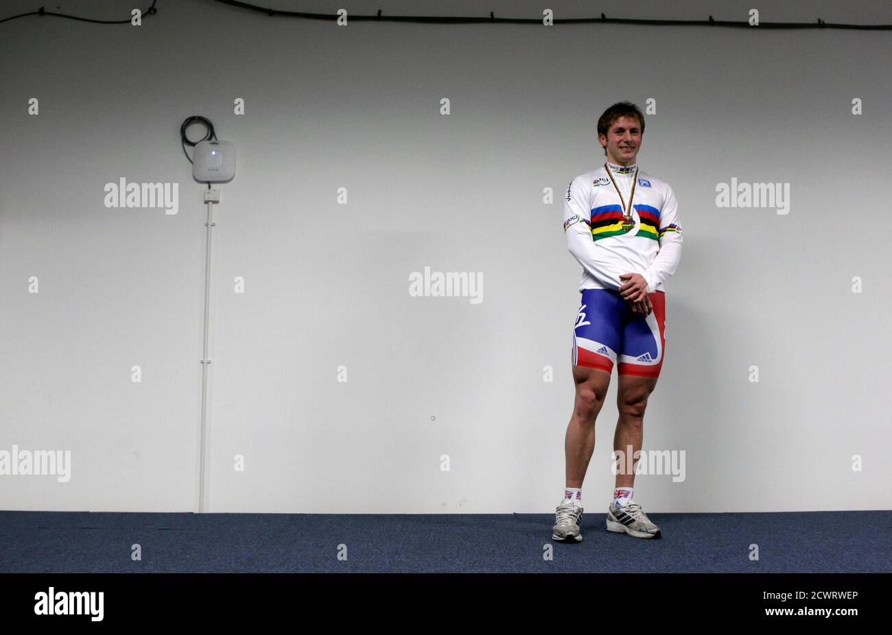 British Cyclist Jason Kenny Shows Off The World Individual Sprint Championship Jersey At The Olympic Velodrome In London February 16 2012 Kenny Was Promoted To World Individual Sprint Champion After Frenchman Gregory