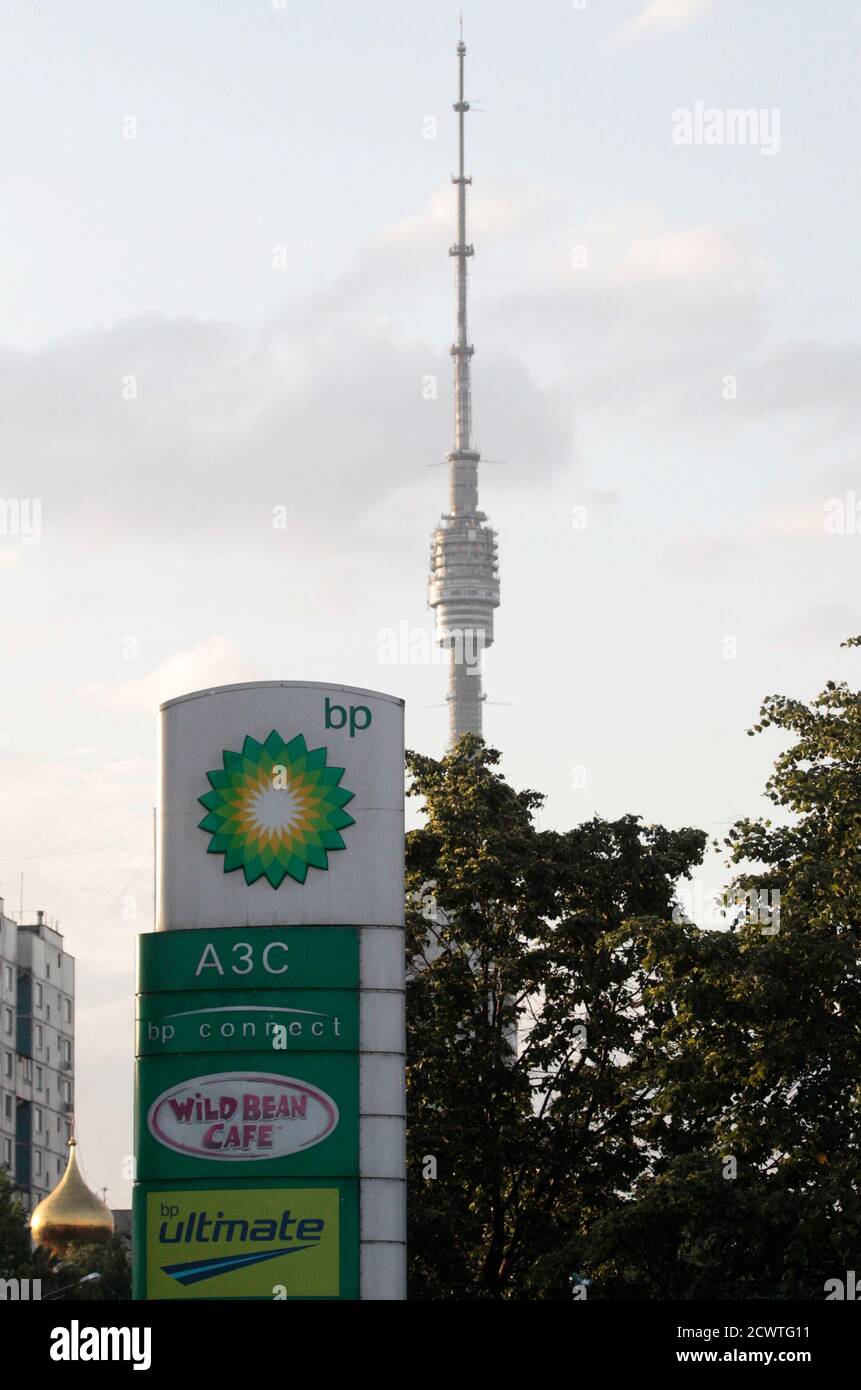 A sign board of a BP petrol station is seen with the Ostankino telecommunications tower in the background, in Moscow June 1, 2012. A Russian state firm has offered to buy BP Plc's half share in its Siberian joint venture, a source said on Friday, in what would amount to a stunning reversal for the British firm and a bold assertion of Kremlin control over the oil sector.  REUTERS/Sergei Karpukhin  (RUSSIA - Tags: BUSINESS ENERGY) Stock Photo