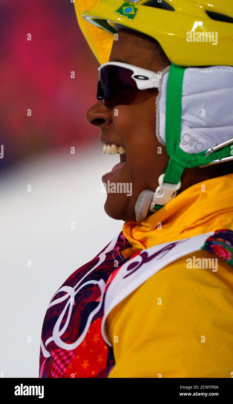 Brazil's Joselane Santos reacts during the women's freestyle skiing aerials qualification round at the 2014 Sochi Winter Olympic Games in Rosa Khutor February 14, 2014. Santos was the only woman in aerials qualifying to take off from the smallest of the six ramps, perform the simplest jump, finish last and promptly burst into tears. Considering the Brazilian former gymnast had strapped on skis for the first time only seven months ago, though, she could rightly consider executing two clean jumps on the Extreme Park hill an Olympic triumph. REUTERS/Mike Blake (RUSSIA  - Tags: SPORT SKIING OLYMPI Stock Photo