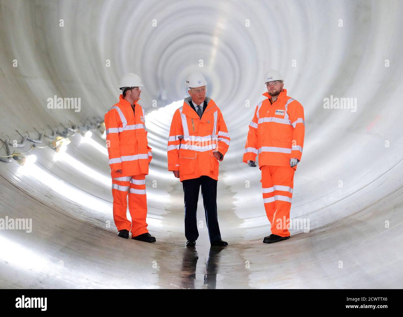Britain's Prince Charles (C) visits the recently constructed Lee Tunnel to mark the 150th anniversary of London's sewer network at the Abbey Mills Pumping Station in East London,  February 18, 2015. REUTERS/POOL/Christopher Pledger (BRITAIN - Tags: ROYALS ENVIRONMENT) Stock Photo