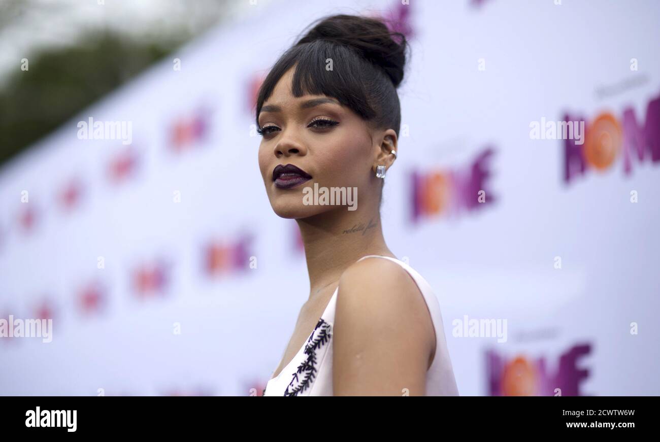 Cast Member Rihanna Who Is The Voice Of Gratuity Tip Tucci Poses At A Special Screening Of The Animated Movie Home In Los Angeles California March 22 15 The Movie Opens In