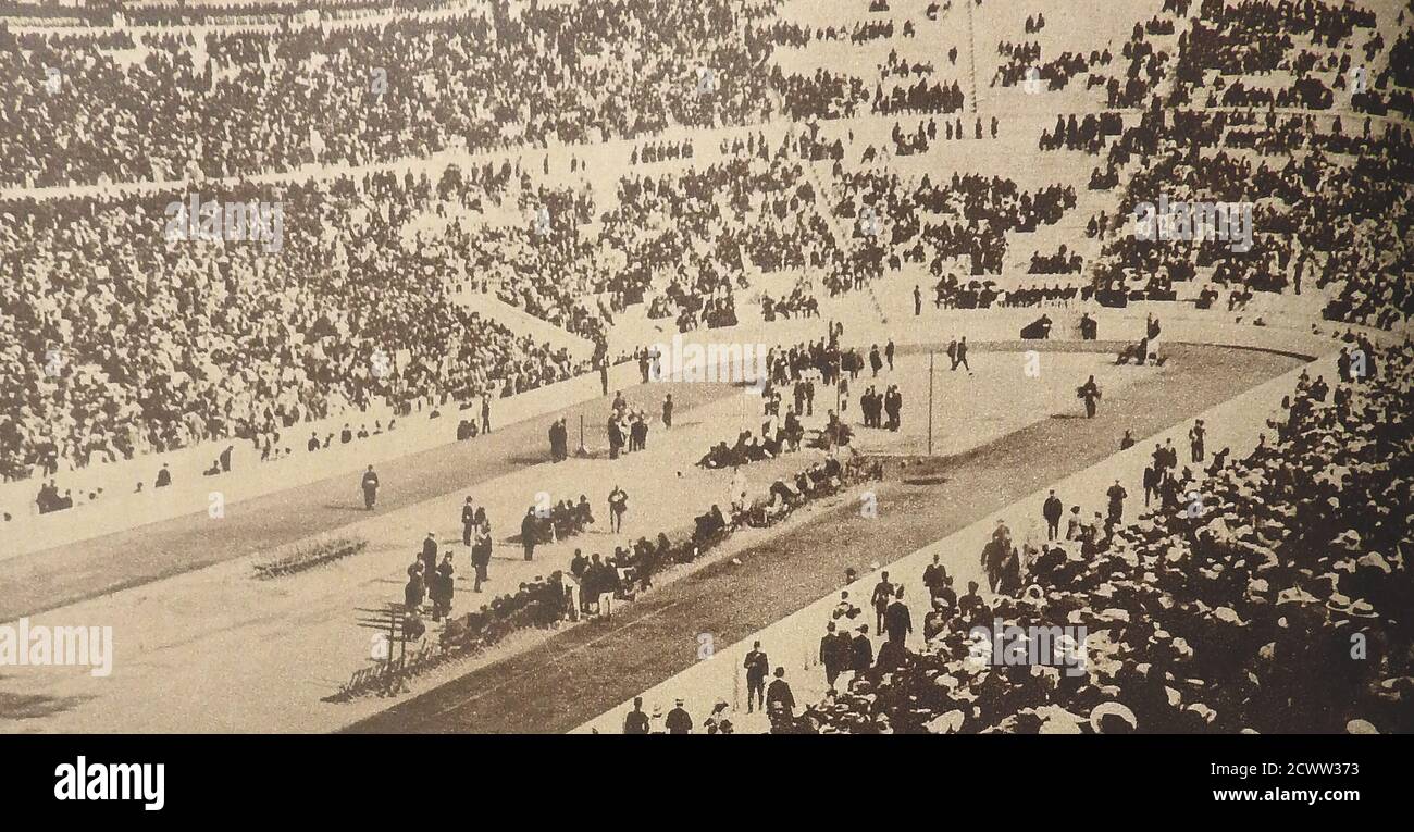 An old historic photograph taken in the Panathenaic Stadium at the 1906 Olympic Games ( also known as the 1906  Intercalated Games or the 1906  Summer Olympic) in Athens, Greece.Though considered to be Olympic Games and  referred to as the 'Second International Olympic Games in Athens' by the International Olympic Committee   the medals are not today officially recognized by the IOC . They were held from 22 April to 2 May 1906 and were opened by The official opening of the games was done by King George I of Greece. 6,000 school children attended the first ever Olympic closing ceremony Stock Photo