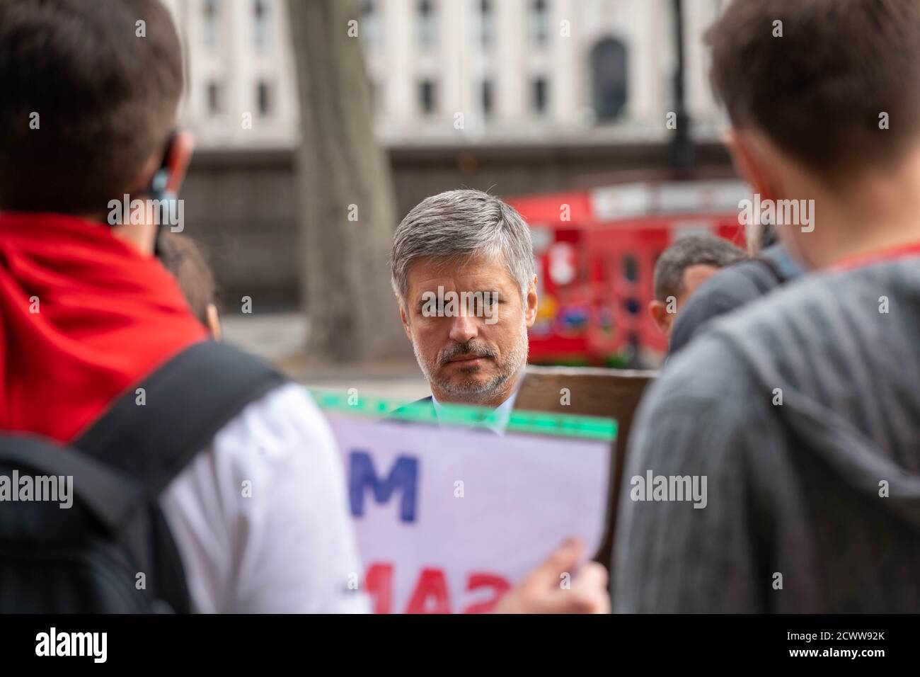 London, UK. 30th Sep, 2020. Vadym Prystaiko Ukraine's Ambassador Extraordinary and Plenipotentiary to the United Kingdom arrives at Portcullis House London where he engaged with protesters against the current regime in Belarus Credit: Ian Davidson/Alamy Live News Stock Photo