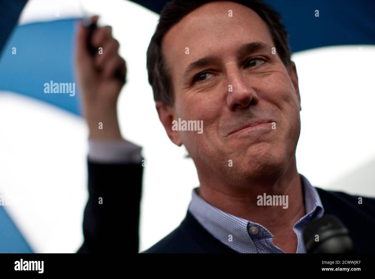 U.S. presidential primary candidate Rick Santorum arrives for a campaign rally at Hudson's Smokehouse in Lexington, South Carolina January 20, 2012. REUTERS/Benjamin Myers    (UNITED STATES - Tags: POLITICS ELECTIONS) Stock Photo