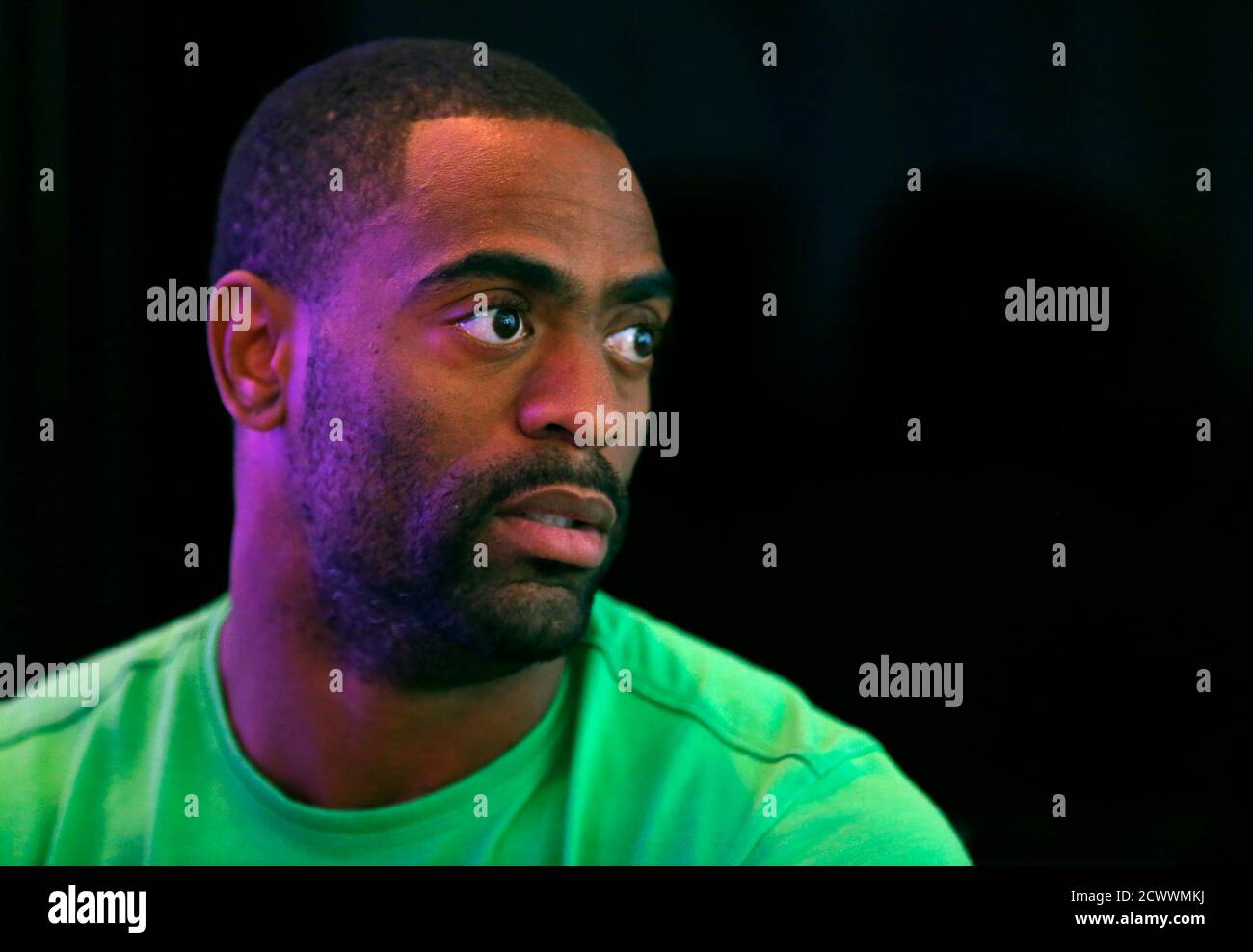 U.S. sprinter Tyson Gay speaks to reporters at the U.S. Olympic athletics trials in Eugene, Oregon June 21, 2012. Soft-spoken and humble, Gay seems so different from most modern-day sprinters. He seldom raises his voice, rarely if ever makes bold predictions and generally keeps a low profile outside his passion for social media. Yet, he can sprint, and no American has ever run faster. Picture taken June 21. To match story US-OLY-ATHL-GAY-PROFILE           REUTERS/Mike Blake  (UNITED STATES - Tags: SPORT OLYMPICS) Stock Photo