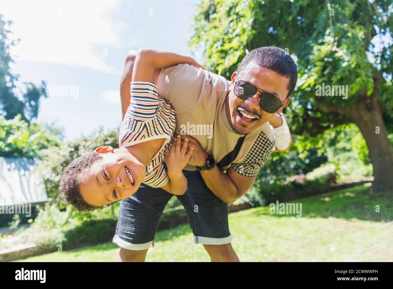 Happy playful father son garden hi-res stock photography and images - Alamy