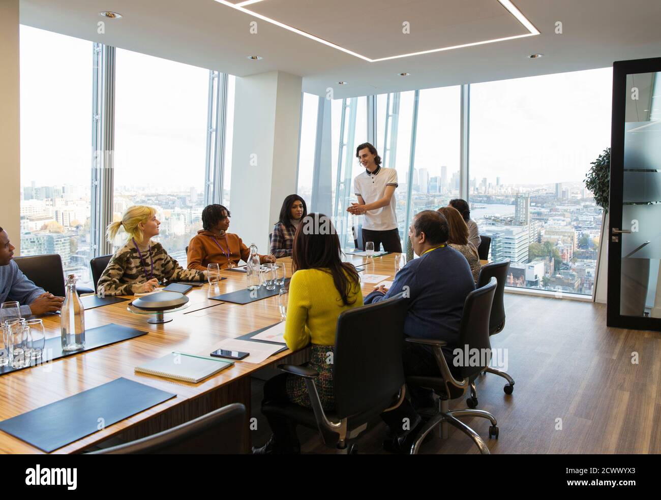 Businessman leading conference room meeting Stock Photo