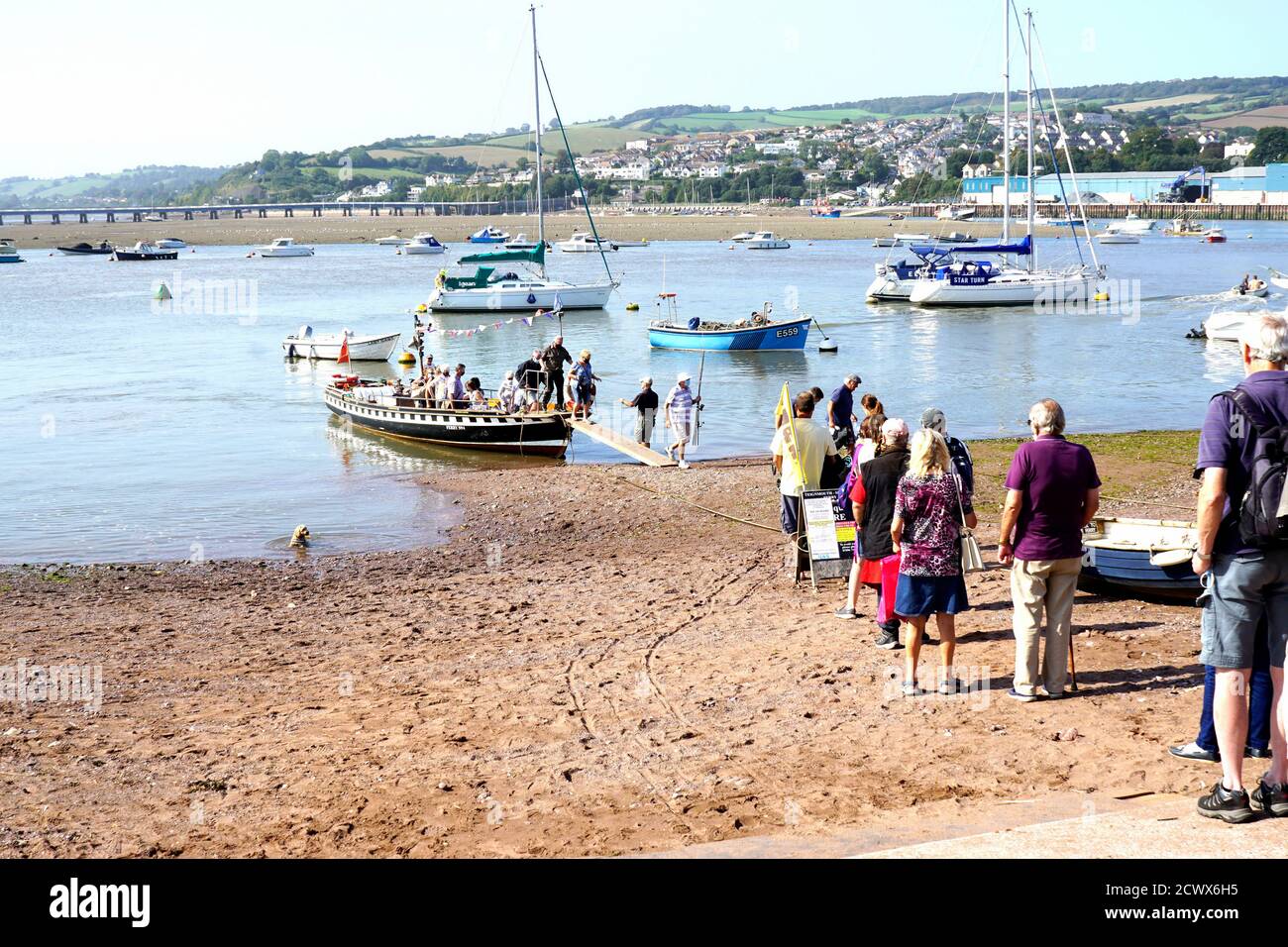 Teignmouth, Devon, UK. September 17, 2020. tourists and locals disembarking and queuing to embark the River Teign ferry to Shaldon at Teignmouth in De Stock Photo