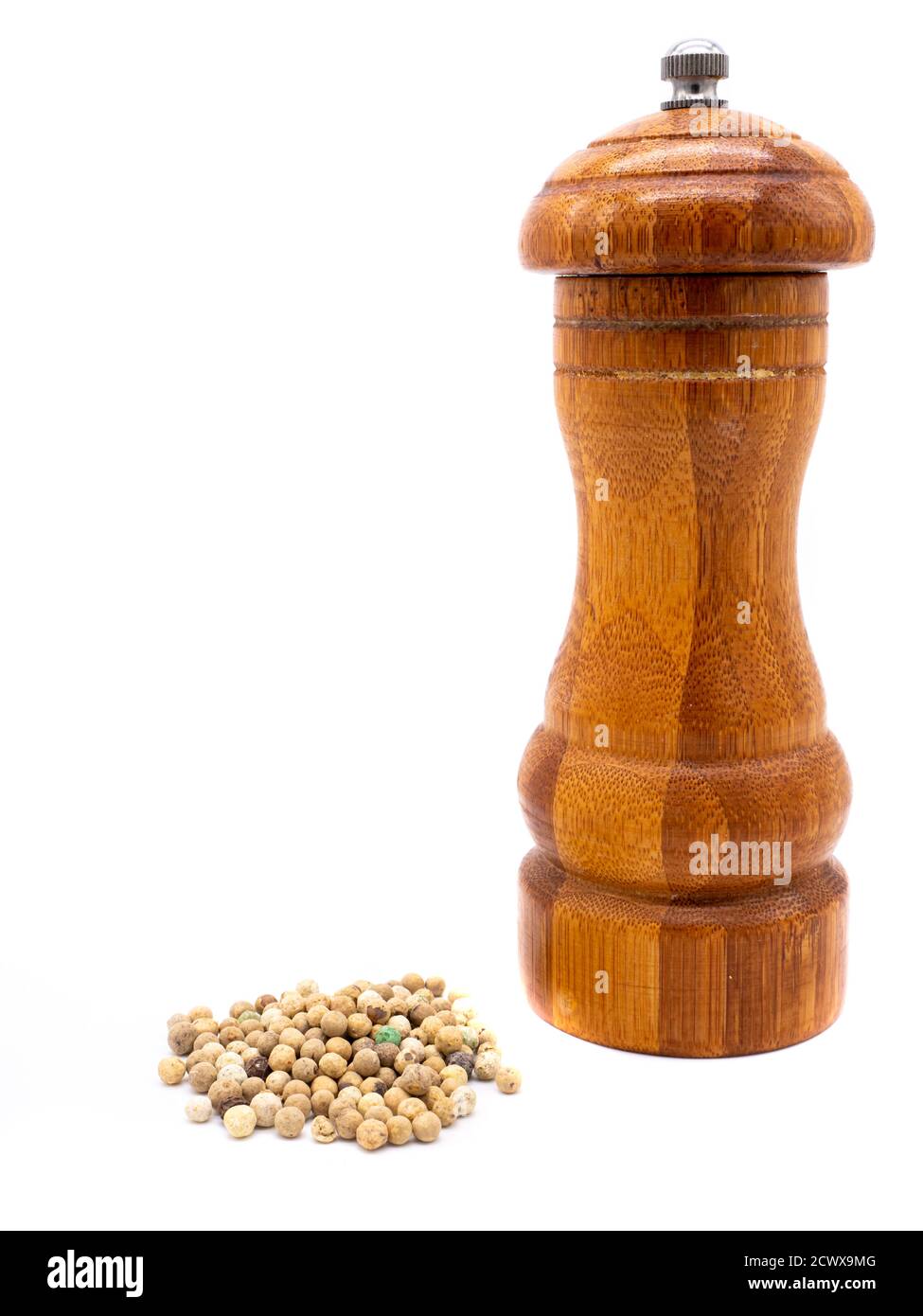 Pepper with pepper mill isolated on white background Stock Photo