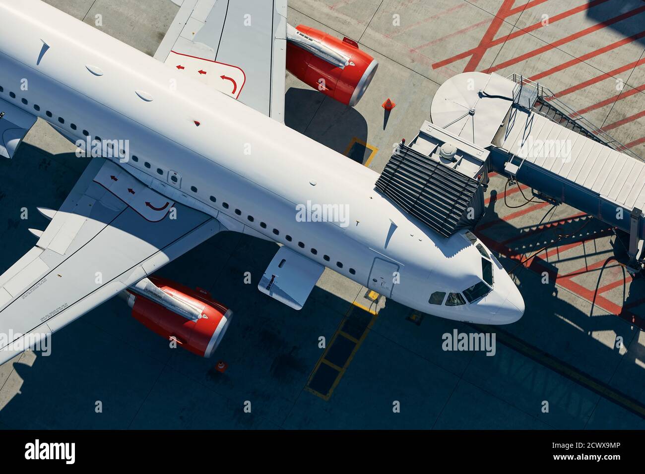 Aerial view of airport. Preparation of airplane before departure. Stock Photo