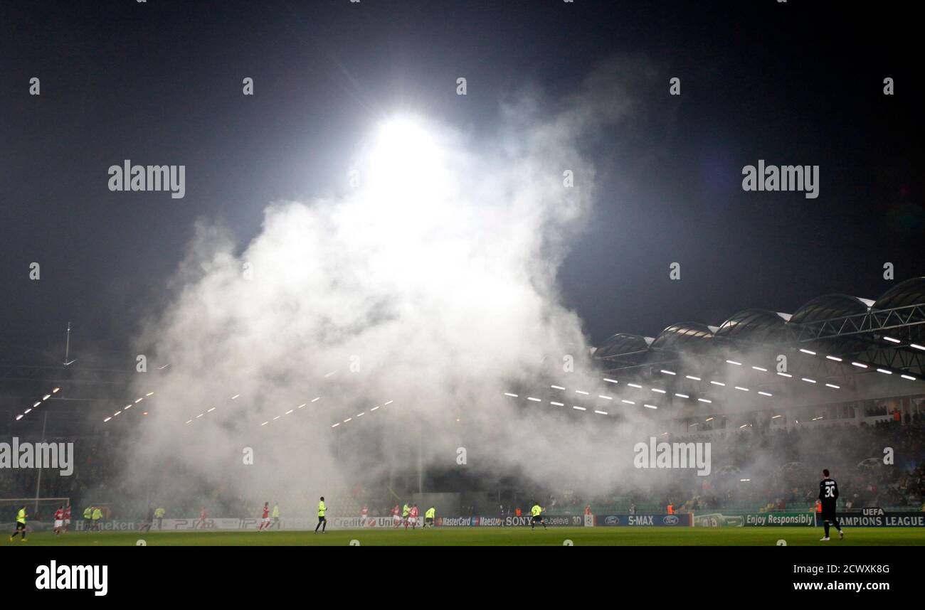 Heavy smoke caused by firecrackers is seen at the Zilina during the Champions League Group F soccer match between Zilina and Spartak Moscow in Zilina December 8, 2010. The match
