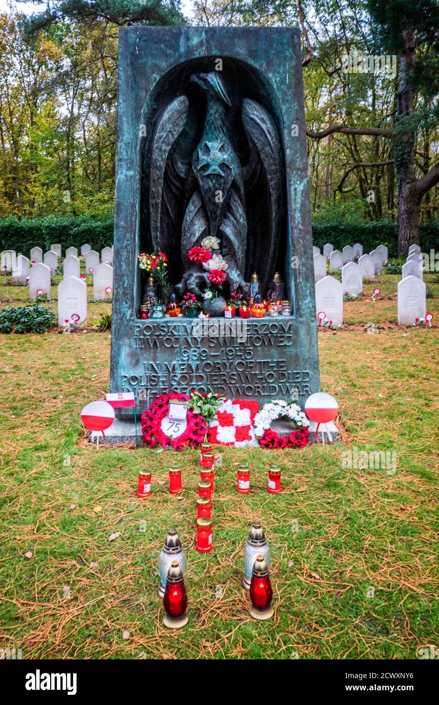 WW2 Polish Memorial with candles alight & tributes Stock Photo
