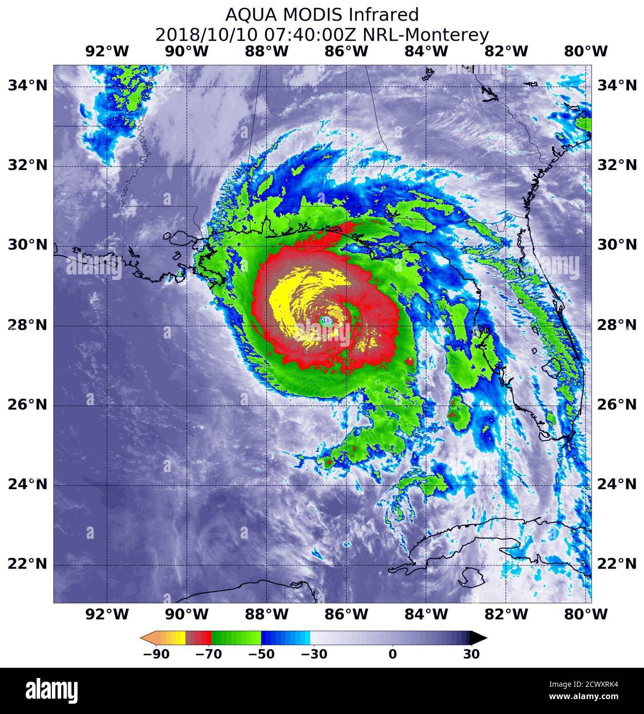 NASA’s Infrared View Shows Power in Hurricane Michael At 3:40 a.m. EDT (0740 UTC) on Oct. 103, the MODIS instrument that flies aboard NASA's Aqua satellite gathered infrared data on Hurricane Michael. Infrared data provides temperature information. The higher the thunderstorms, the colder the cloud tops. The coldest cloud tops are the most powerful storms and strongest thunderstorms circled Michael’s center. That’s where cloud top temperatures were as cold as (yellow) minus 80 degrees Fahrenheit (minus 62.2 Celsius).  NASA research has shown that cloud tops with temperatures that cold were hig Stock Photo