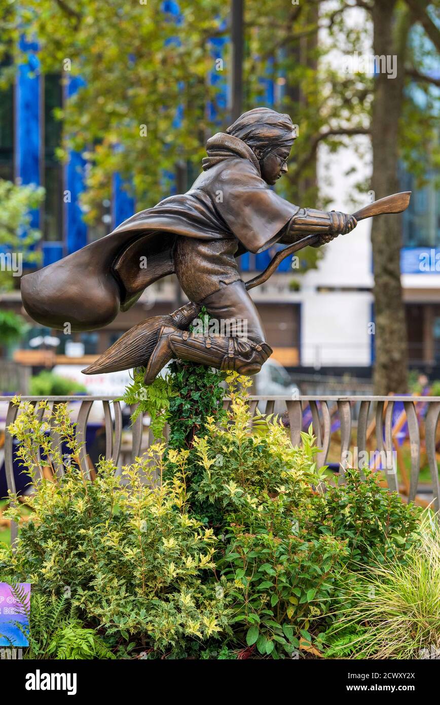 A new statue of Harry Potter in Leicester Square, London which has joined the eight other movie statues already in on display there. Stock Photo