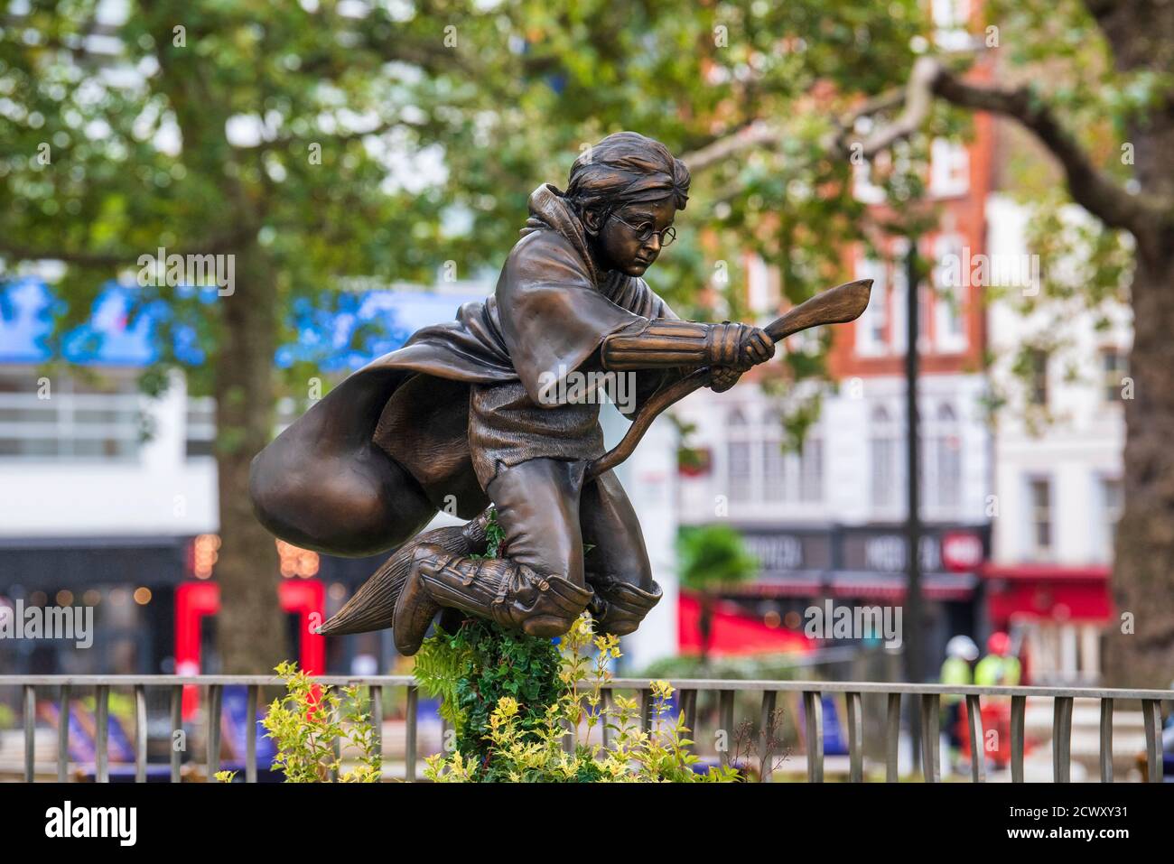 A new statue of Harry Potter in Leicester Square, London which has joined the eight other movie statues already in on display there. Stock Photo