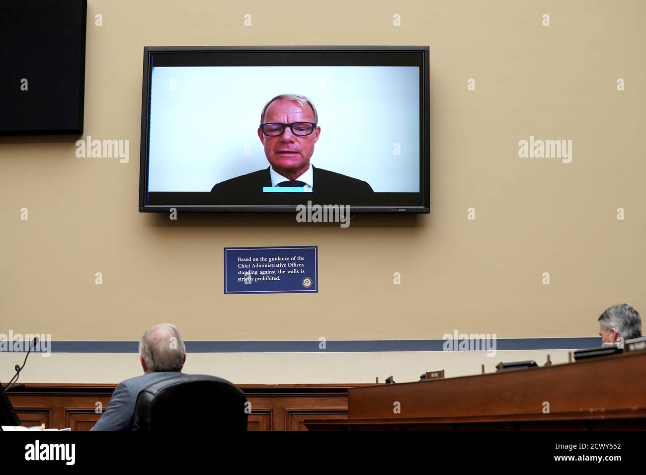 Teva Pharmaceuticals CEO Kare Schultz testifies by video conference during  a hearing before the US House of Representatives Committee on Oversight and  Reform focused on the cost of prescription drugs, in the
