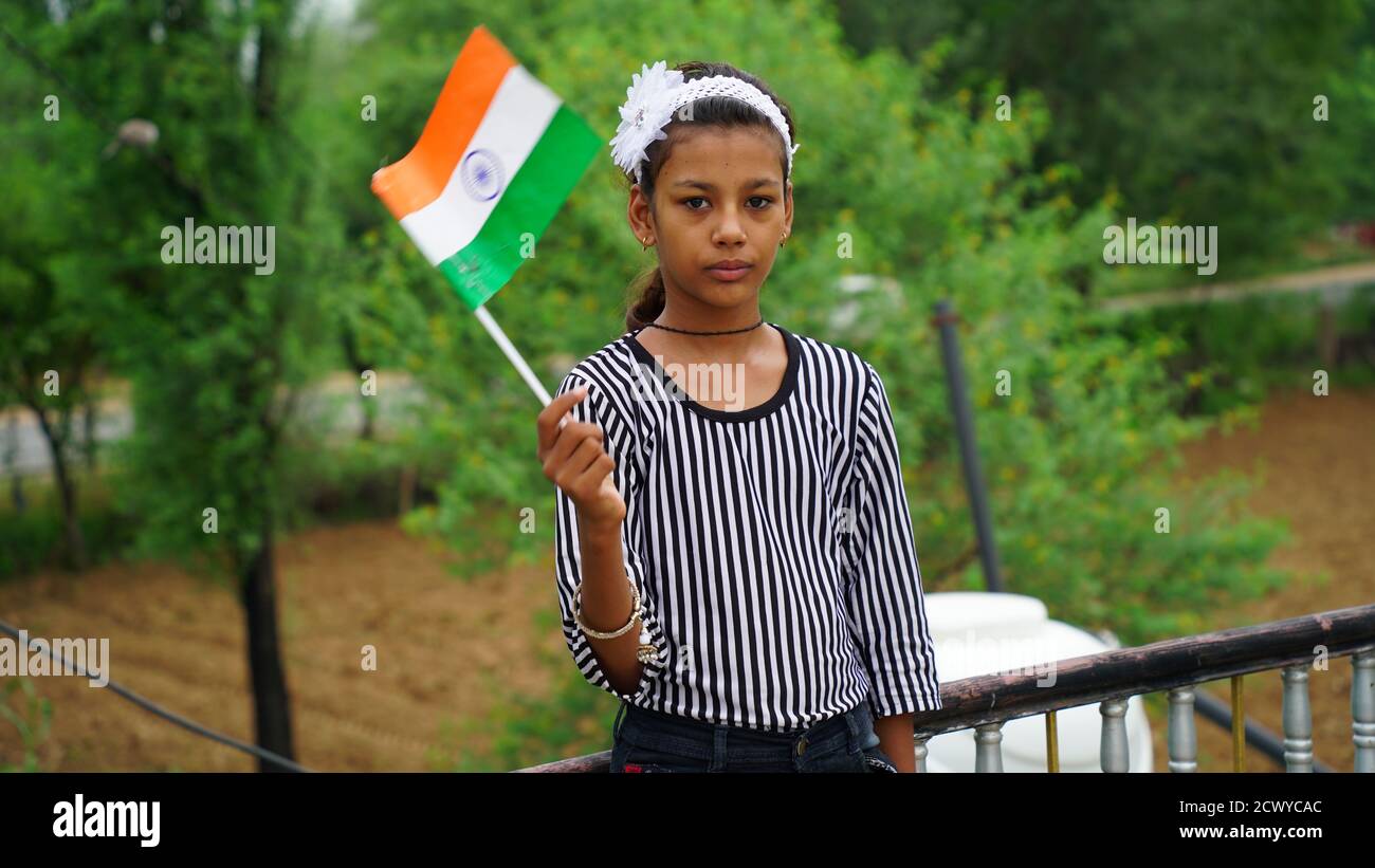 Cute little girl with Indian National Tricolour Flag Stock Photo - Alamy