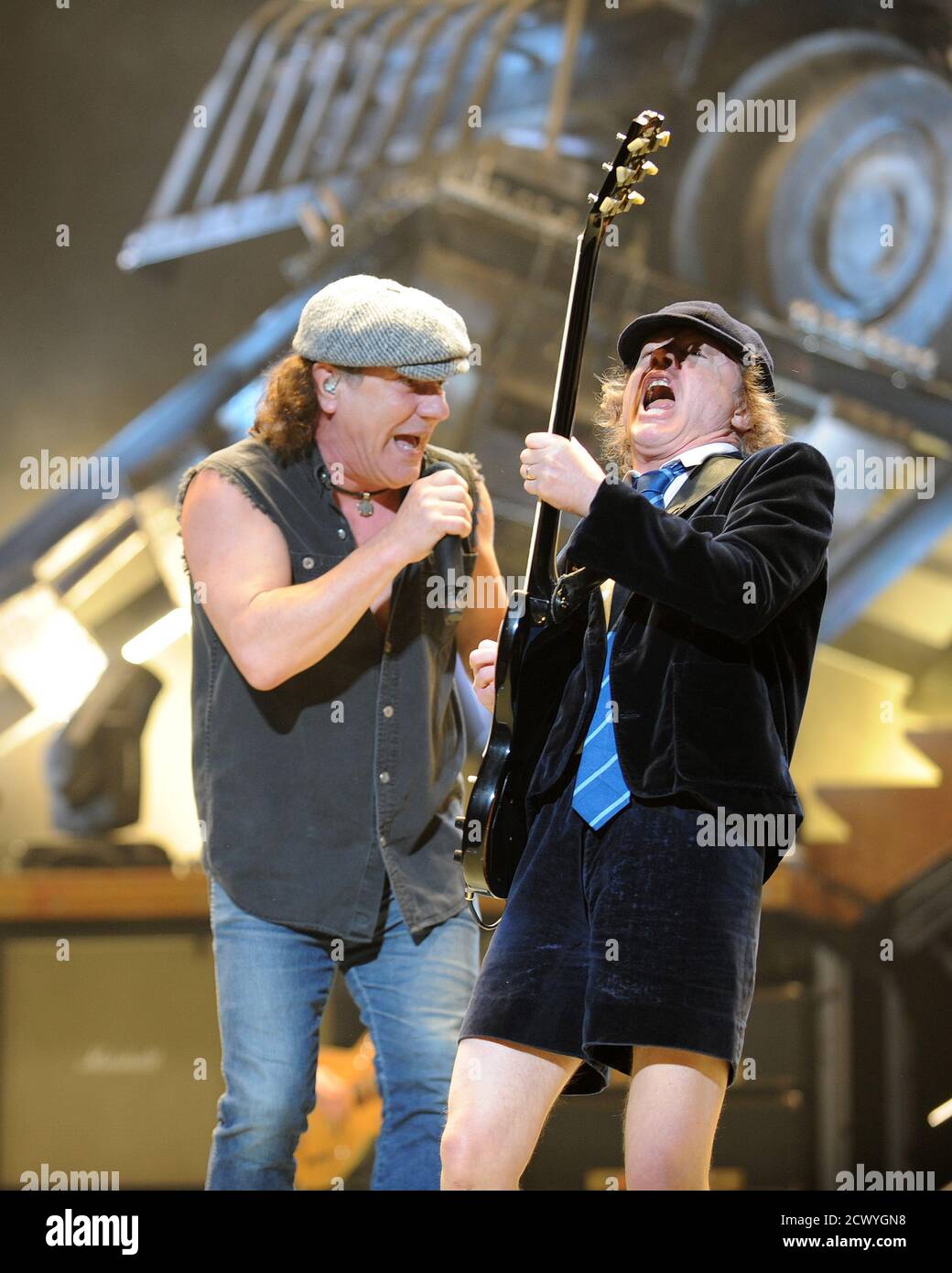 **FILE PHOTO** AC/DC Reunite with New Album On The Way. SUNRISE, FL - DECEMBER 20 : Brian Johnson and Angus Young of AC/DC perform at the Bank Atlantic Center on December 20, 2008 in Sunrise Florida. Credit: mpi04/MediaPunch Stock Photo