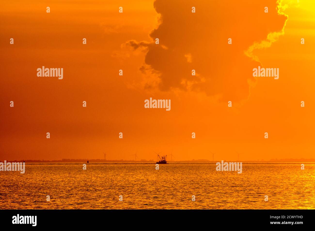Fishing boat in sunset sea hi-res stock photography and images - Alamy