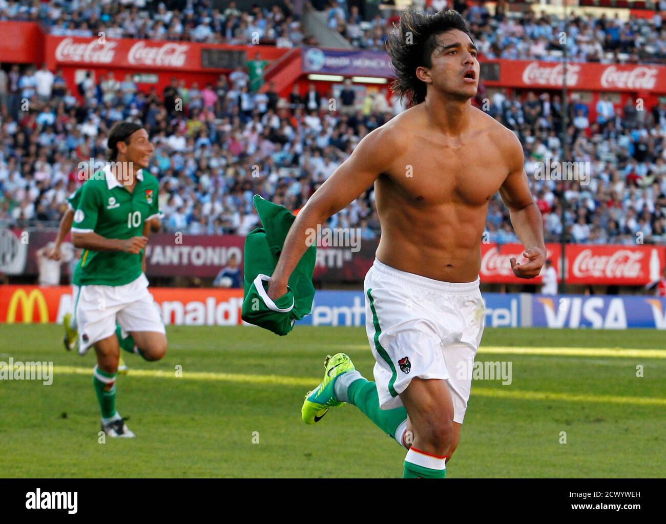 Bolivia S Marcelo Moreno Martins R Celebrates After Scoring Against Argentina In Front His Teammate Pablo Escobar During Their 2014 World Cup Qualifying Soccer Match In Buenos Aires November 11 2011 Reuters Enrique Marcarian