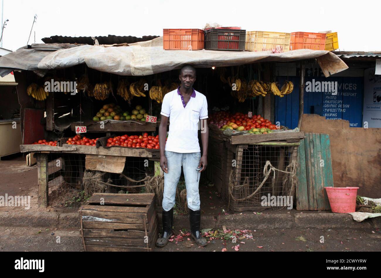 Karl Moi Okoth A 27 Year Old Vegetable And Fruit Seller Poses For A Picture In Front Of His Makeshift Shop In Nairobi S Kibera Slum In The Kenyan Capital April 30 12 Okoth Karl Moi Okoth A 27 Year Old Vegetable And Fruit Seller Poses For A Picture In Front Of His Makeshift Shop In Nairobi S Kibera Slum In The Kenyan Capital April 30 12 Okoth