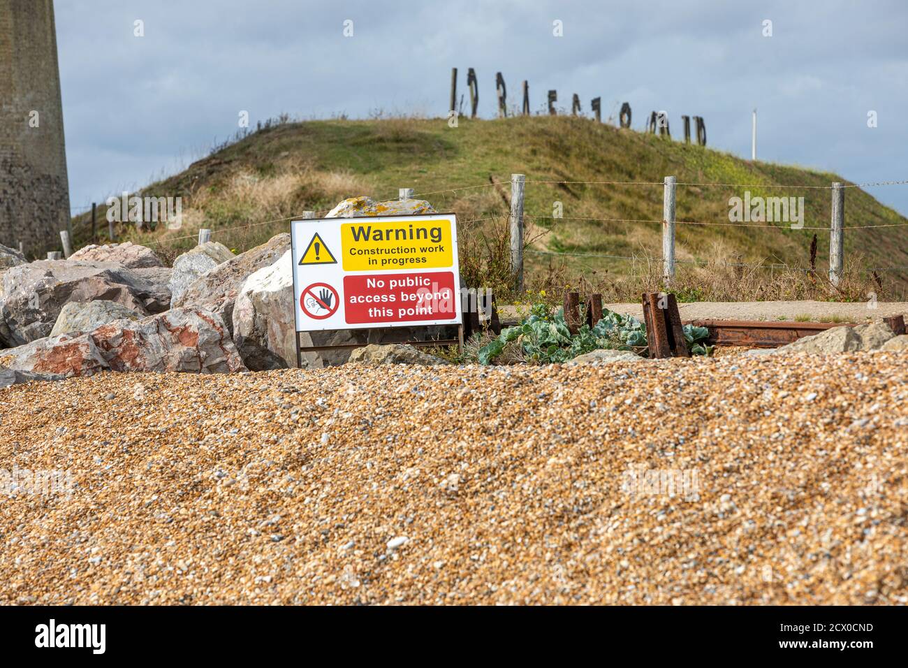 A warning, no public access sign on the beach at Hythe Ranges, Kent UK  Stock Photo - Alamy