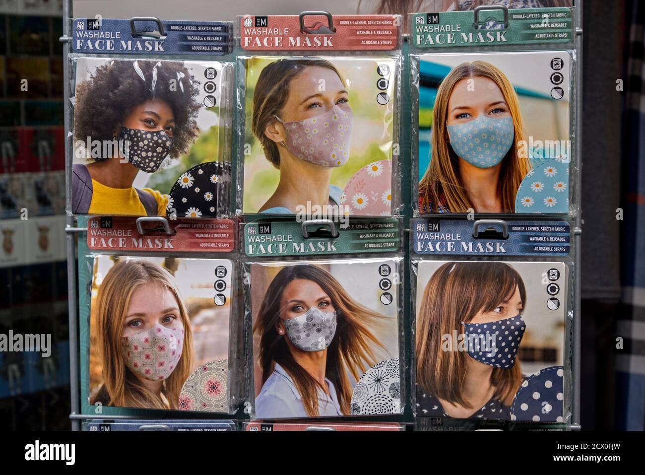 Display of face masks for sale outside a shop in Edinburgh, Scotland, Uk. Stock Photo