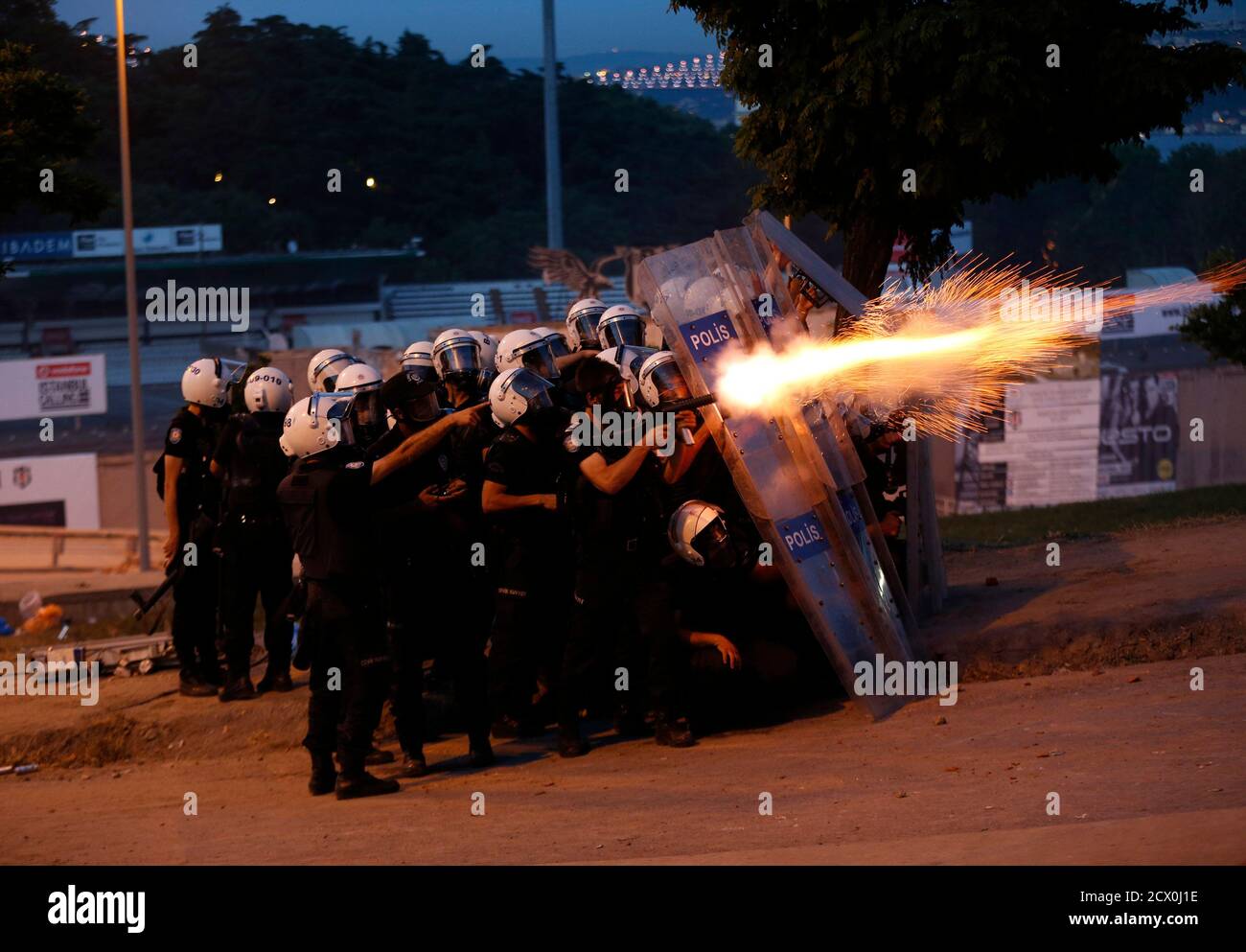 Riot police use tear gas to disperse the crowd during an anti-government protest in Istanbul June 3, 2013. Turkish Prime Minister Tayyip Erdogan accused anti-government protesters on Monday of walking 'arm-in-arm with terrorism', remarks that could further inflame public anger after three days of some of the most violent riots in decades. Hundreds of police and protesters have been injured since Friday in the riots, which began with a demonstration to halt construction in a park in an Istanbul square and grew into mass protests against what opponents call Erdogan's authoritarianism. REUTERS/Mu Stock Photo