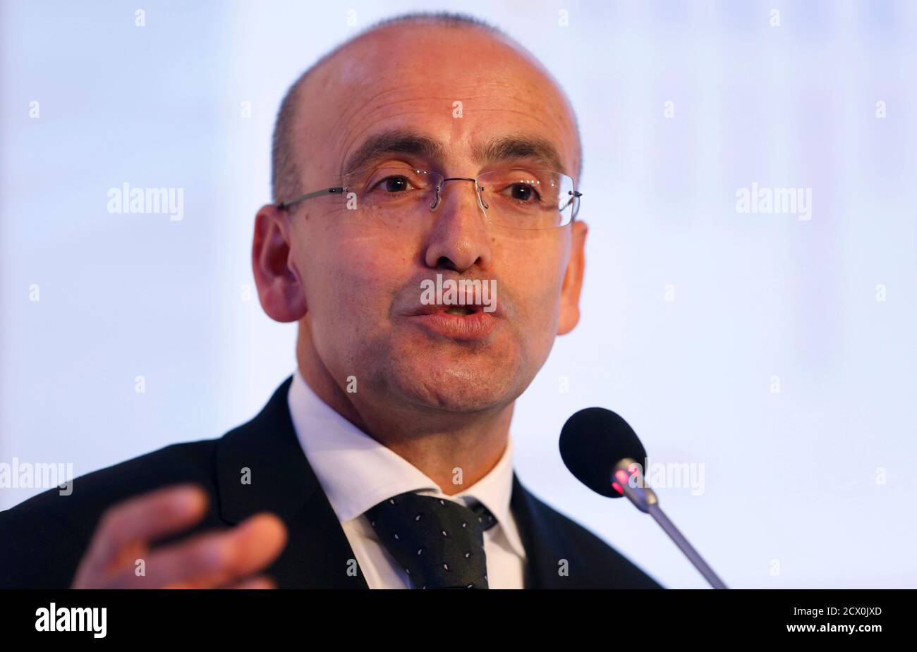 Turkey's Finance Minister Mehmet Simsek speaks during the 4th Istanbul Finance Summit in Istanbul September 19, 2013. Turkey will get only brief relief from the surprise postponement of a reduction in U.S. economic stimulus and must press ahead with plans to rebalance its own economy, Simsek said on Thursday. To match Interview TURKEY-ECONOMY/ REUTERS/Murad Sezer (TURKEY - Tags: POLITICS BUSINESS) Stock Photo