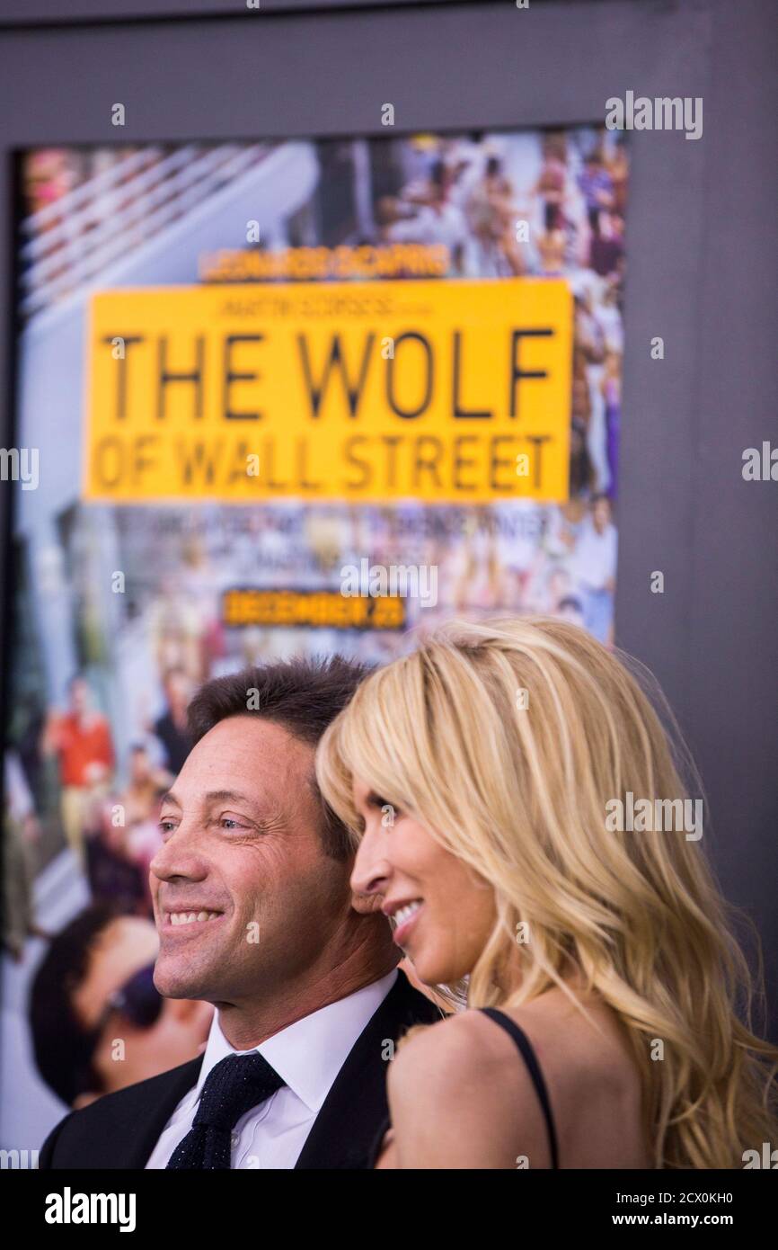Jordan Belfort, the financier convicted of fraud and the author of the book  "The Wolf of Wall Street", arrives for the premiere of the film adaptation  of his book with his wife,