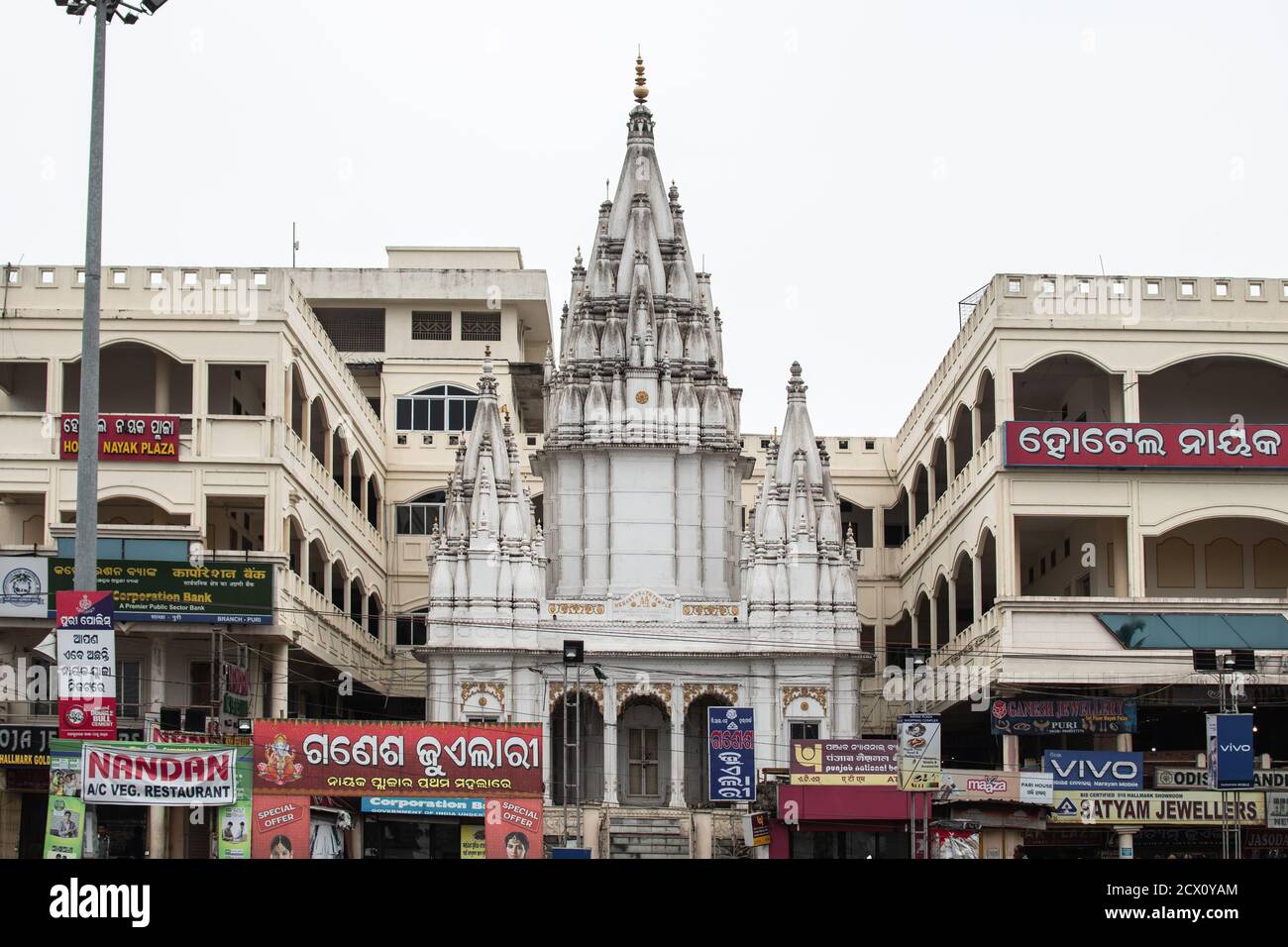 Puri, India - February 3, 2020: Street view of a small white hindu temple close to Jagannath on February 3, 2020 in Puri, India Stock Photo