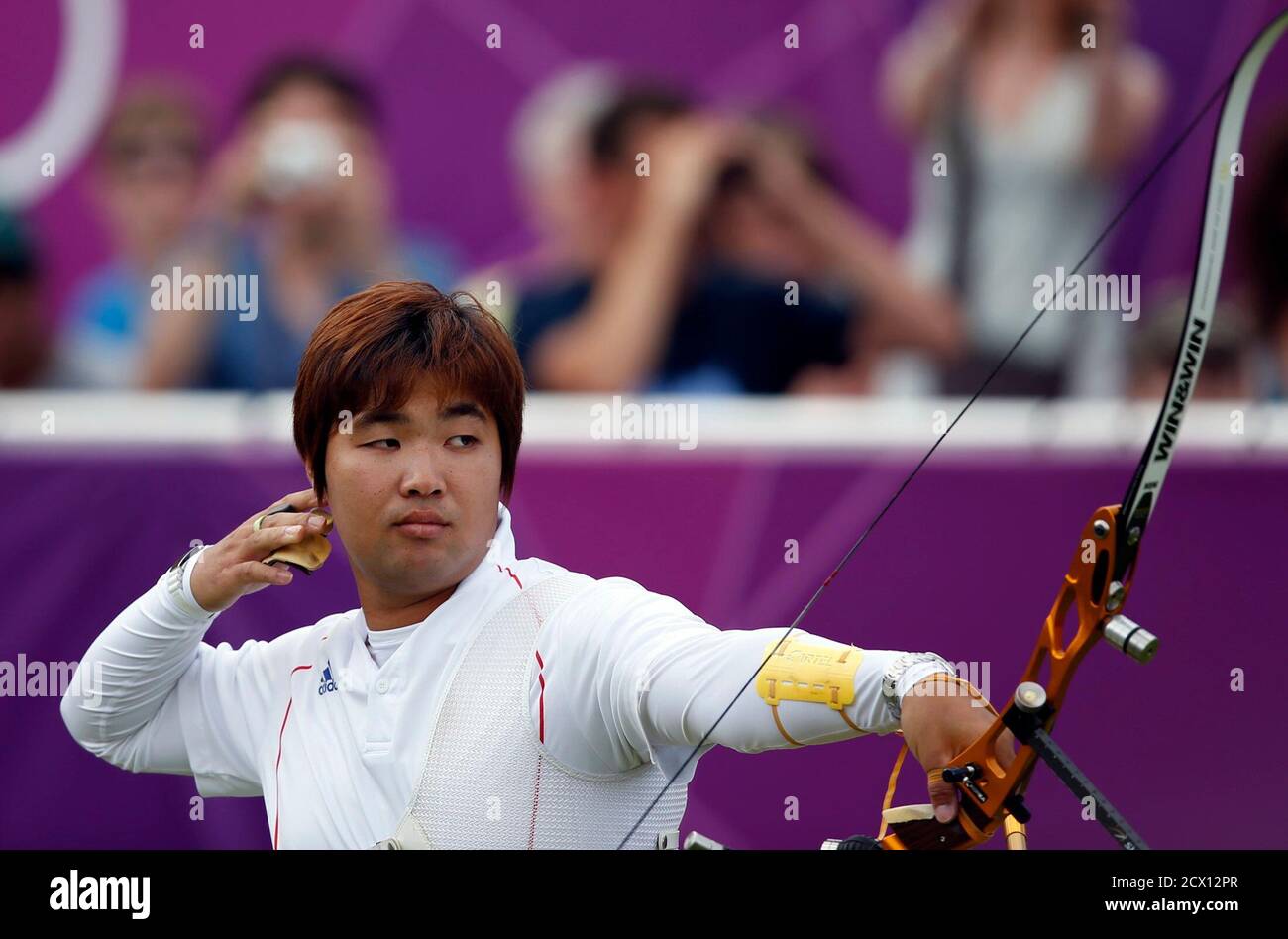 South Korea S Im Dong Hyun Fires An Arrow During The Men S Archery Team Quaterfinals At The Lords Cricket Ground During The London 2012 Olympics Games July 28 2012 Reuters Suhaib Salem Britain