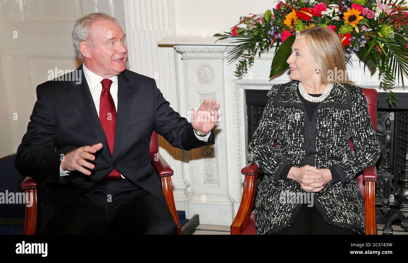 U.S. Secretary of State Hillary Clinton meets with Northern Ireland's Deputy First Minister Martin McGuinness at Stormont Castle in Belfast December 7, 2012. Clinton travelled to Northern Ireland on Friday to lend her support to the British province's fragile peace, the frailty of which was underlined by overnight rioting on the eve of her visit and the seizure of a bomb. REUTERS/Kevin Lamarque  (NORTHERN IRELAND - Tags: POLITICS) Stock Photo