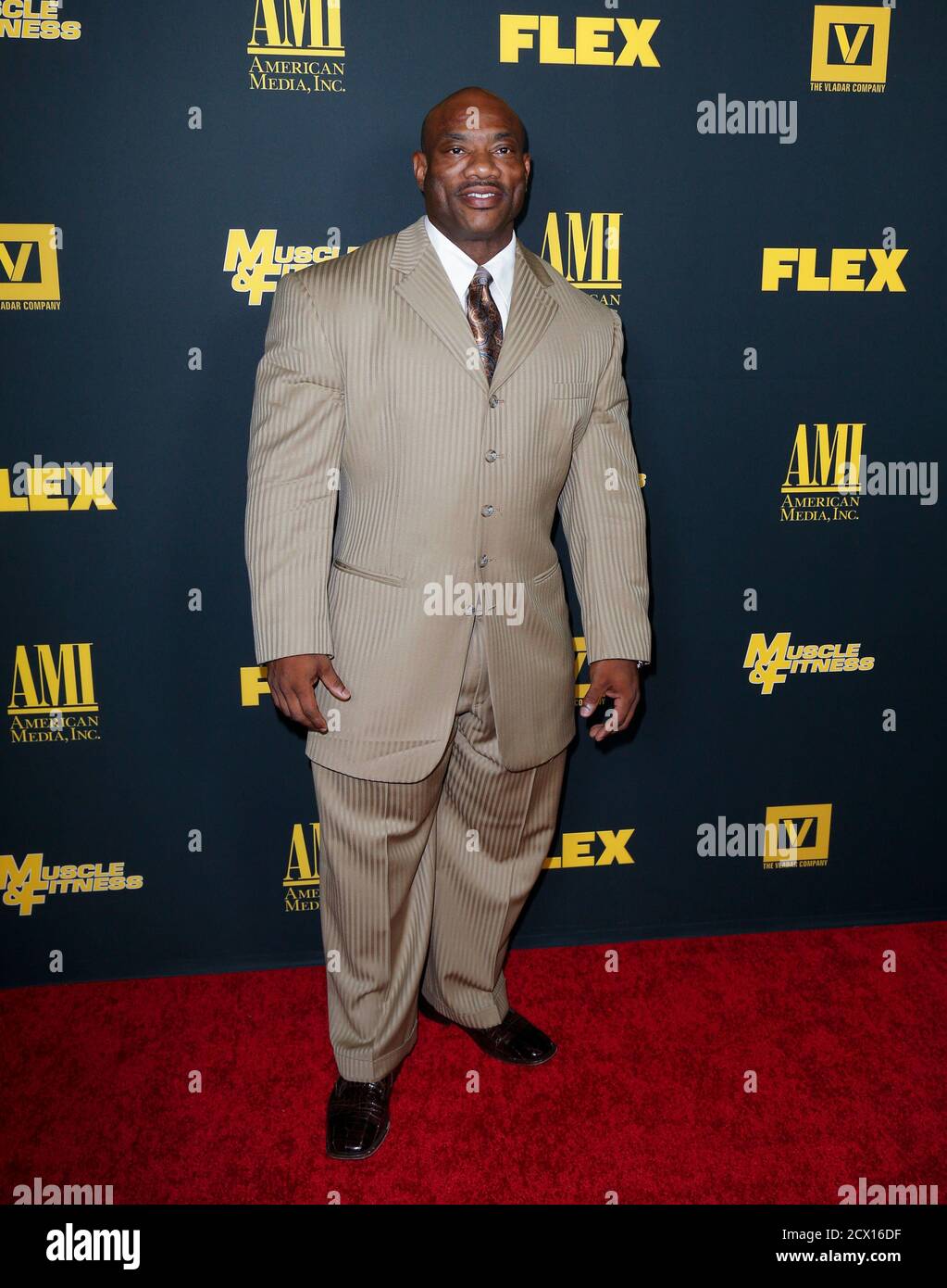 Professional bodybuilder Dexter 'The Blade' Jackson poses at the Los Angeles premiere of the documentary film 'Generation Iron' in Hollywood, California September 18, 2013. The film examines the professional sport of bodybuilding today. REUTERS/Danny Moloshok (UNITED STATES - Tags: ENTERTAINMENT SPORT) Stock Photo
