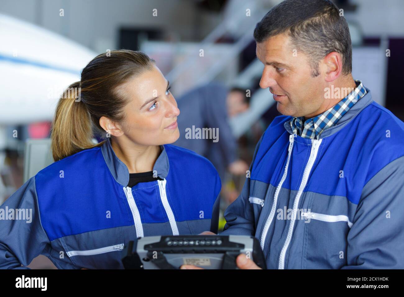 two technicians working in car service Stock Photo