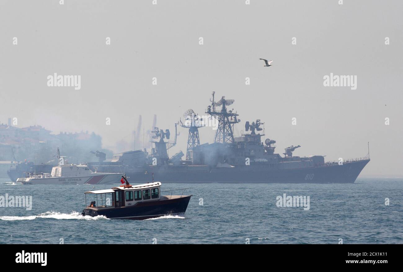 A Turkish Navy Cost Guard Boat L Escorts The Russian Navy Destroyer Smetlivy In The Bosphorus