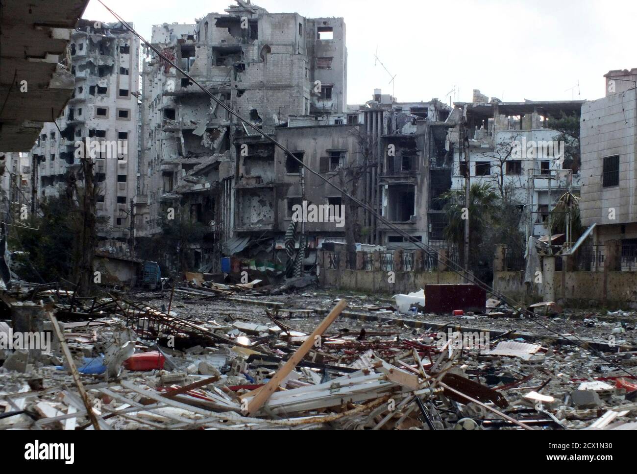 A general view of rubble and damaged buildings in Jouret al-Shayah, Homs February 2, 2013. Picture taken on February 2, 2013. REUTERS/Yazen Homsy (SYRIA - Tags: CONFLICT POLITICS CIVIL UNREST) Stock Photo