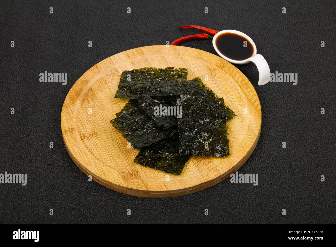Tasty Nori chips with soya sauce Stock Photo Alamy