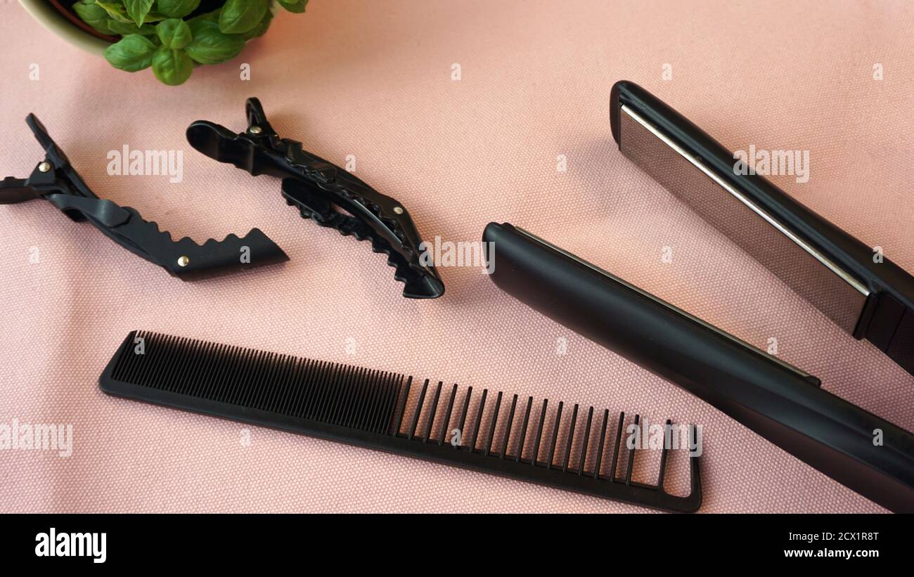 Hairdresser Tools, clips, comb a hair straightener Stock Photo